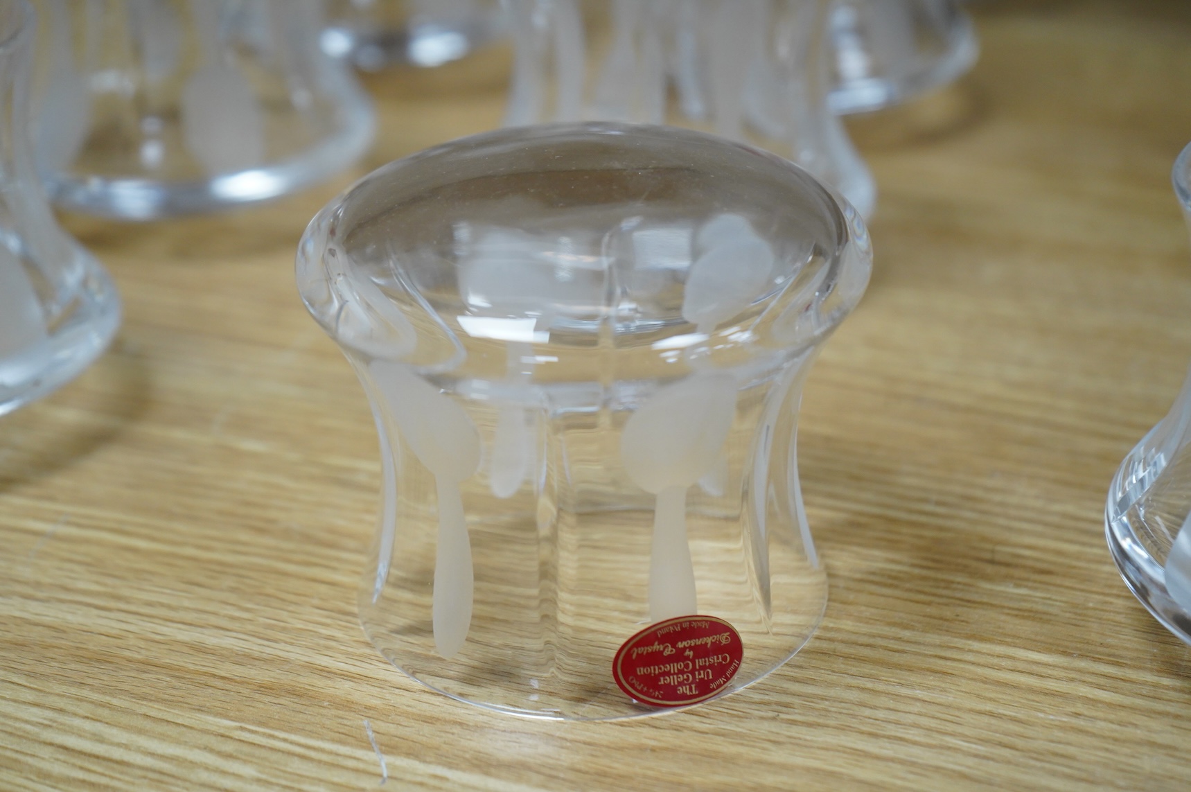 A collection of twenty five Uri Geller Crystal Collection whisky tumblers by Dickenson Crystal, 9cm high
